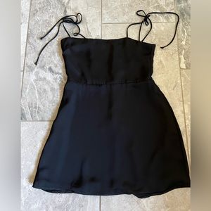 Resa black silky sweet mini. NEVER WORN